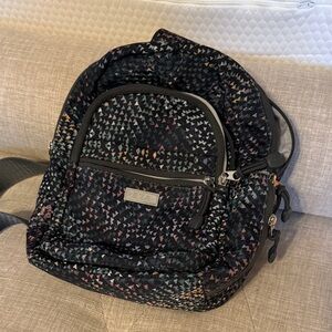 Mini back pack style sling bag